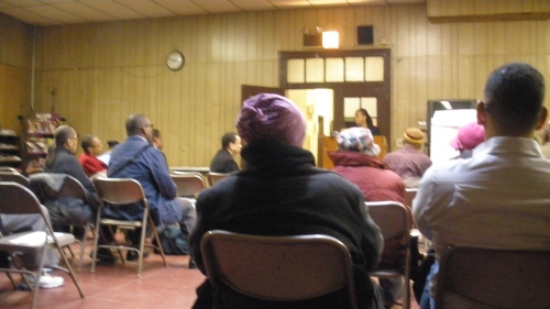 Harlem Block Associations listen to Athena Moore from Gail Brewer's Office